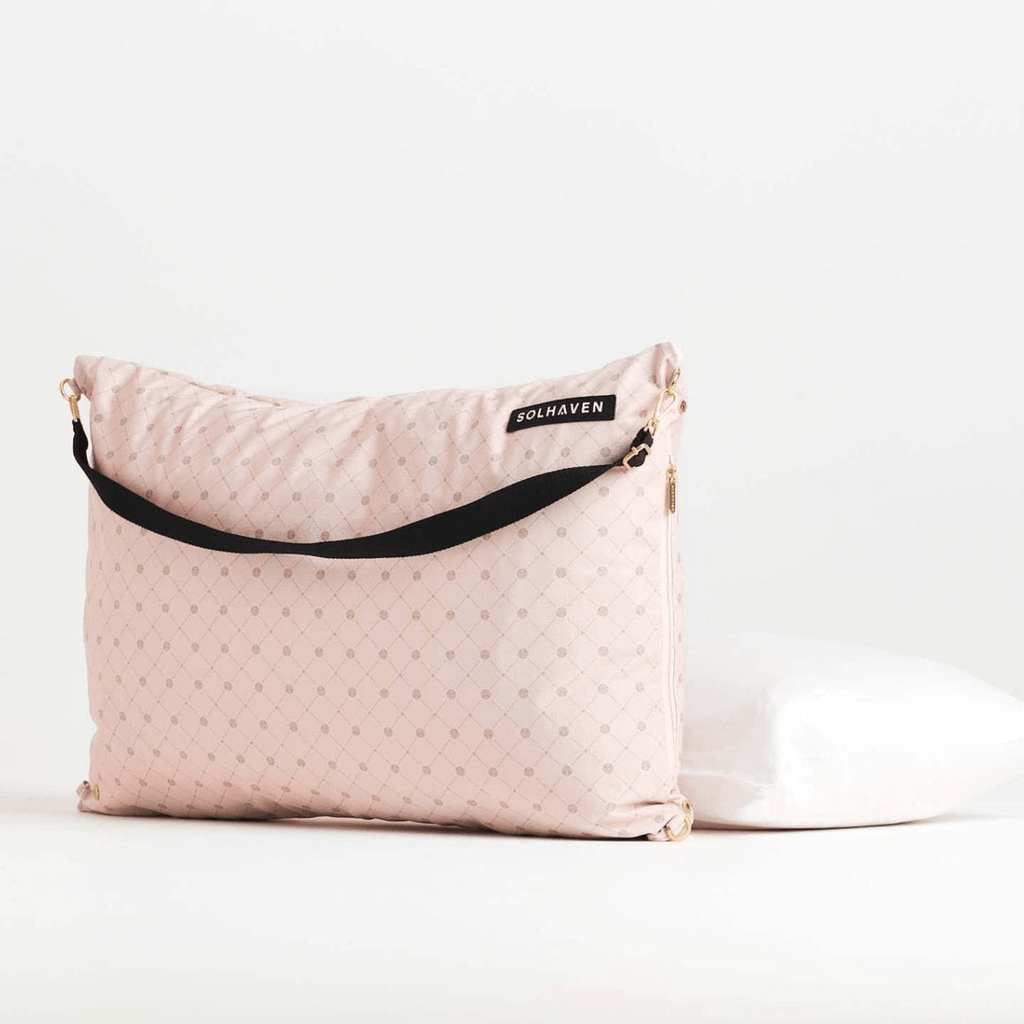 Solhaven Dream First™ Pillow Bag - Sole, with a pillow sitting in the background