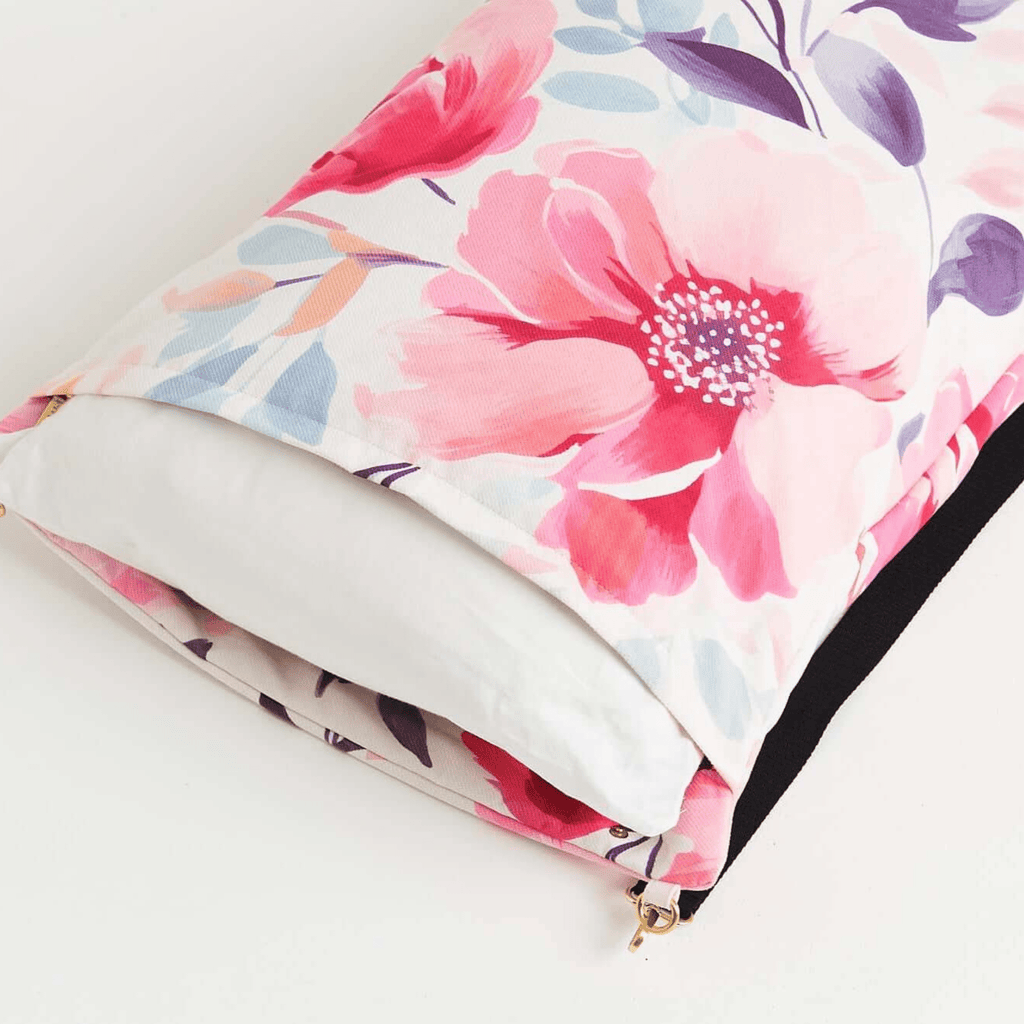 Dream First™ Pillow Bag - Flora - Solhaven showing a pillow peeking out the end of the bag