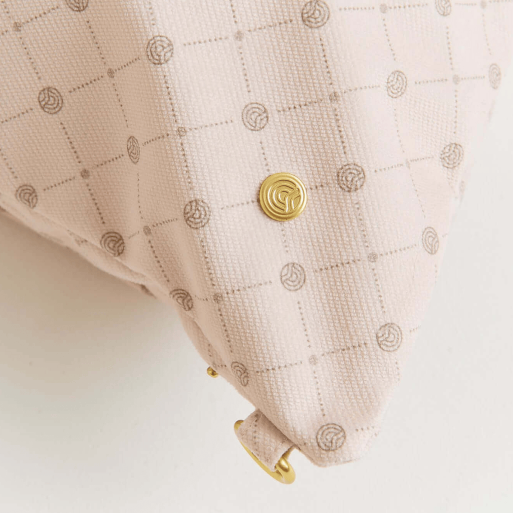 Solhaven Dream First™ Pillow Bag - Sole showing the gold solhaven logo and close up of the fabric of bag