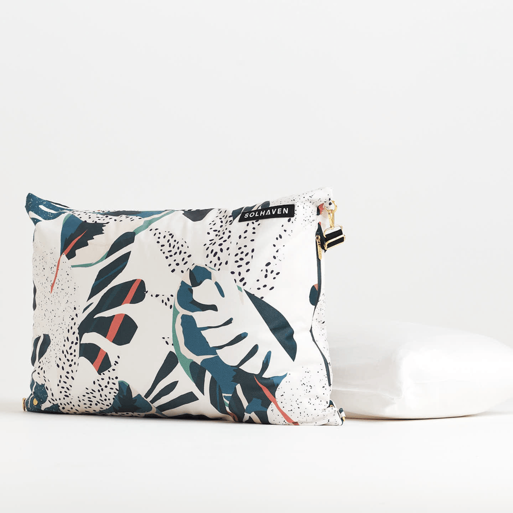 Dream First™ Pillow Bag - Tropic - Solhaven with a pillow in the background